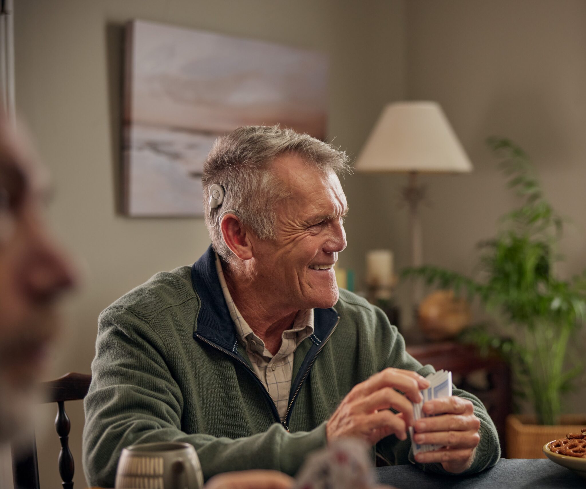 A man wearing a cochlear implant A man wearing a cochlear implant